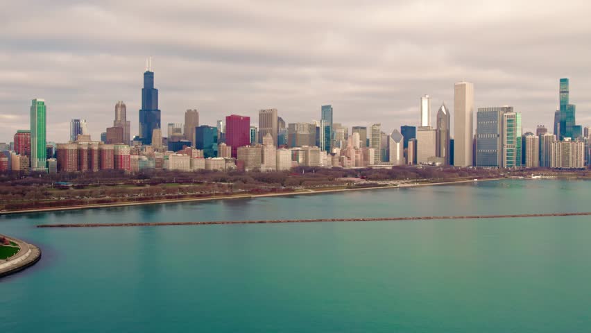 Approaching Chicago aerial view over Michigan lake.