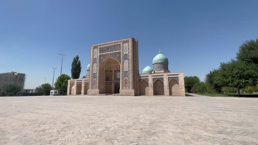 4K Gimbal Shot: Approaching Hazrati Imam complex, Tashkent, Uzbekistan; Showcasing Islamic Architecture, Mosaic Tilework, and Central Asian Heritage. Royalty-Free Stock Footage #3415510995