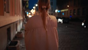 Beautiful blonde woman walking and having fun at night in city streets - Powered by Shutterstock - Get 15% off with code: PIKWIZARD15