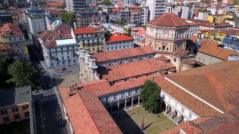 Aerial view of the Milan Conservatory and Giuseppe Verdi Library next to Santa Maria della Passione. Music school in a building of classical architecture. Classical music. Milan, Italy 1.02.2024 – Video báo chí có sẵn