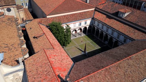 Aerial view of the Milan Conservatory and Giuseppe Verdi Library next to Santa Maria della Passione. Music school in a building of classical architecture. Classical music. Milan, Italy 1.02.2024 – Video báo chí có sẵn