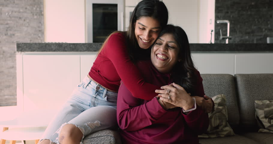 Grown up young 20s loving daughter visit her middle-aged 55s mother, hugging, spend time together, enjoy moment of tenderness, express care and love, feeling support. Multigenerational family bonding Royalty-Free Stock Footage #3416436263