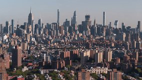 Establishing Aerial View Shot of New York City NY, NYC, United States, bright day, Uptown Manhattan, Flatiron Building, Empire State Building, Rockefeller Center, Times Square, Hudson Yards