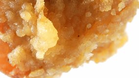 In mouthwatering macro video, watch as piping hot fried chicken rests on the plate, its crunchy exterior inviting you to take a bite. Food concept. Food stock footage.
