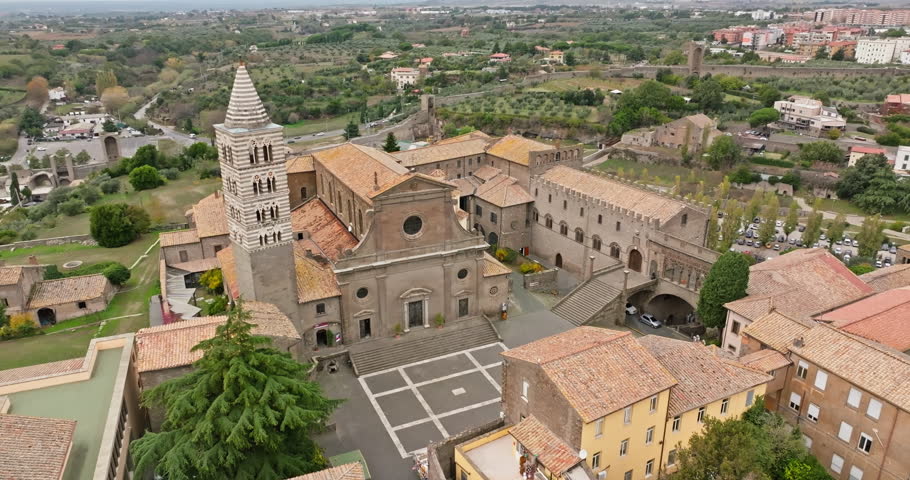 Aerial view of the cityscape of Viterbo, Italy. A beautiful historical city with an ancient cathedral and a church in the center of the old city. High quality 4k footage