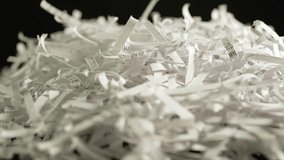 Shredded confidential documents on paper at the table. Office papers with sensitive information got destroyed. Preventative measures to fight identity thief and top secret documents leakage. - Powered by Shutterstock - Get 15% off with code: PIKWIZARD15