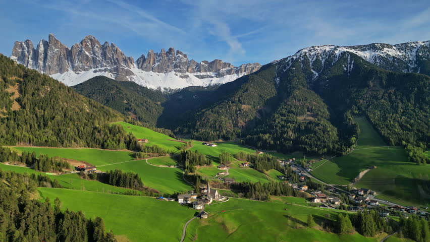 Spring landscape with Santa Magdalena village, Italian Dolomites Alps, in South Tyrol, Val di Funes, Italy, 4k