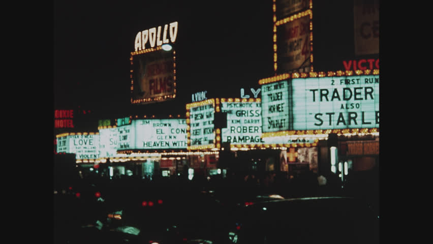 NEW YORK, 1971, 42nd Street movie marquees, Times Square at night, traffic Royalty-Free Stock Footage #34169608