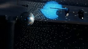 Disco ball rotates. Close-up. Mirror ball spinning and making club lasers indoors. Performance. The reflection of lights.