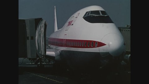 NEW YORK, 1971, TWA Boeing 747 jumbo jet at gate at Kennedy International Airport, close up at gate