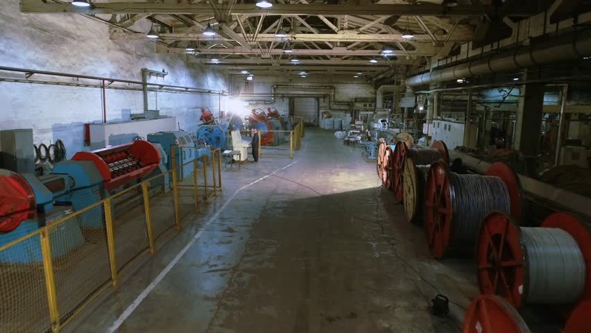 Wire manufacturing process. Assembly twisting stranded wire. Modern equipment at the factory for the production of wires.