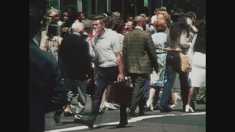 NEW YORK, 1971, Large crowd of people walking the street
