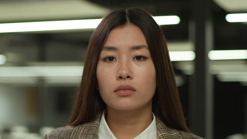 Close up negative bad problem trouble emotions female face portrait sad upset Asian businesswoman student girl frustrated business woman Korean Japanese office worker bankruptcy grief Chinese employer Royalty-Free Stock Footage #3417265297