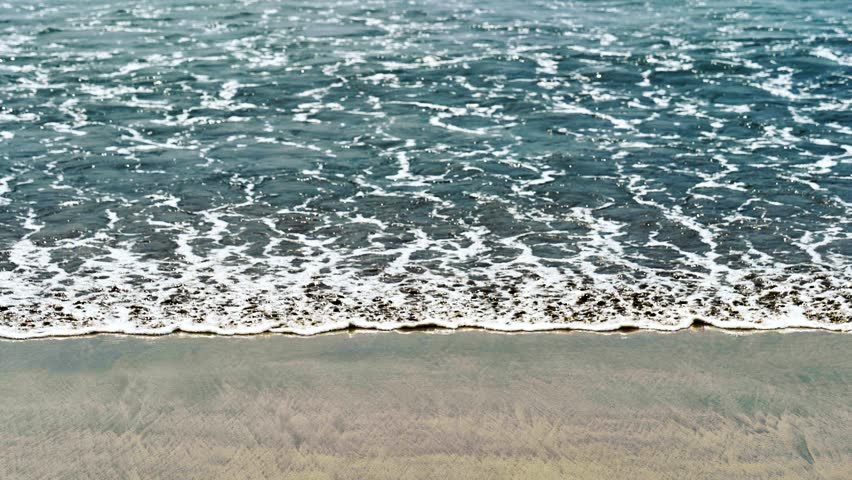 Waves crashing on Kuta beach, Bali. With fine brownish white sand. Royalty-Free Stock Footage #3417313771
