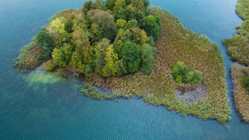 Aerial View of Small Island with Trees In The Middle Of Galve Lake in Lithuania
