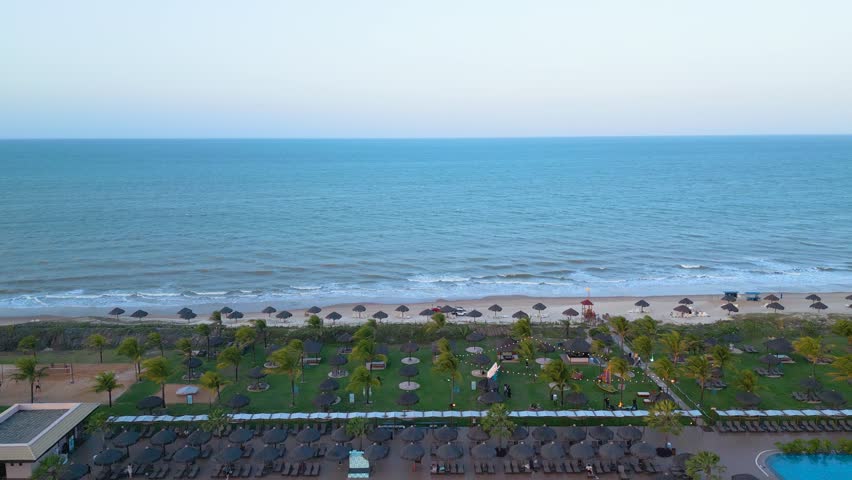 Luxury Tropical Resort on Rio Grande do Norte Brazil. Flying Above Swimming Pools and Between Palm Trees, Drone Shot
