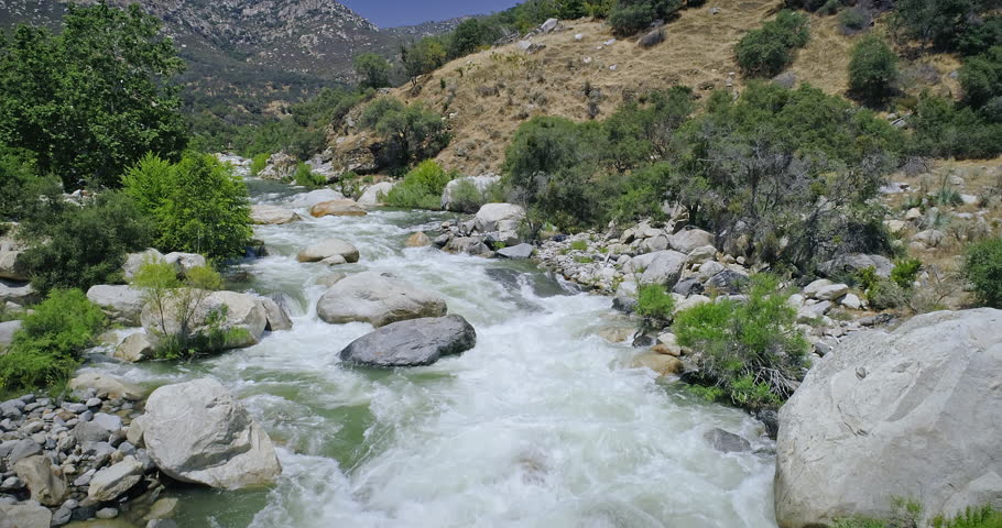 Aerial over river rapids and bridge near Sequoia National Park Entrance, Three Rivers, California, USA