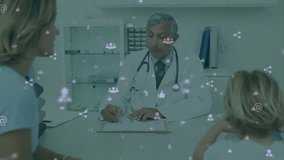 Animation of networks of social media icons over caucasian male doctor with female patient. Medical services, healthcare, digital interface, networks and communication, digitally generated video. - Powered by Shutterstock - Get 15% off with code: PIKWIZARD15