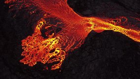 Lava river from active volcano. Red hot burning lava erupts from ground in Iceland. Incredible aerial of the dramatic volcanic eruption of the Litli Hrutur. Shot in 5k resolution. - Powered by Shutterstock - Get 15% off with code: PIKWIZARD15