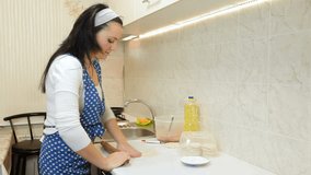 Woman Baking In The Kitchen, Rolling Dough For Meat Pasty On Counter Top