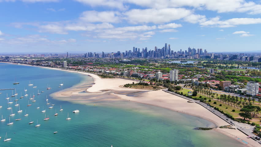 Melbourne, Australia: Aerial view of Albert Park with Albert Park Lake and famous Golf Course in capital city of Victoria, skyscraper skyline of Melbourne central business district (CBD) in background