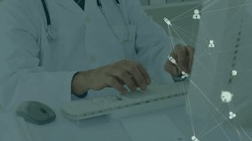 Animation of network of medical icons over senior caucasian male doctor using computer. Medical services, healthcare, digital interface, networks and communication, digitally generated video. - Powered by Shutterstock - Get 15% off with code: PIKWIZARD15