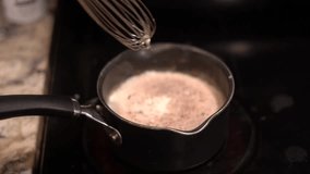 making hot chocolate, chopping chocolate chips, milk, hot cocoa, cooking, drinks, desert,  - Powered by Shutterstock - Get 15% off with code: PIKWIZARD15