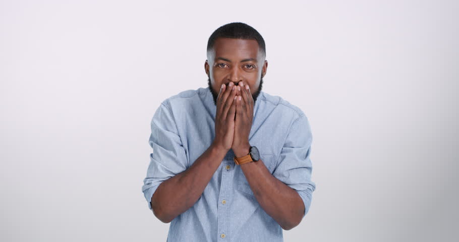 Wow, shocked or hands on face of man in studio for announcement, news or promo on white background. Omg, portrait or African model with unexpected gesture, emoji or expression for mind blown surprise