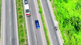 Aerial Tracking Shot of Blue Car on Expressway