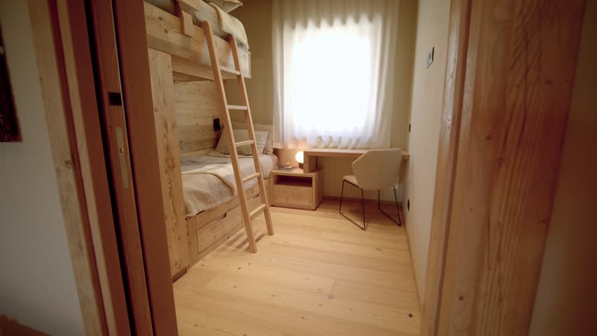 Modern wooden interior design children's bedroom bespoke bunk beds PUSH SHOT Royalty-Free Stock Footage #3417936405