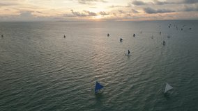 Cinematic footage of a picturesque sea sunset on the Boracay island, Philippines. Aerial ascending video.