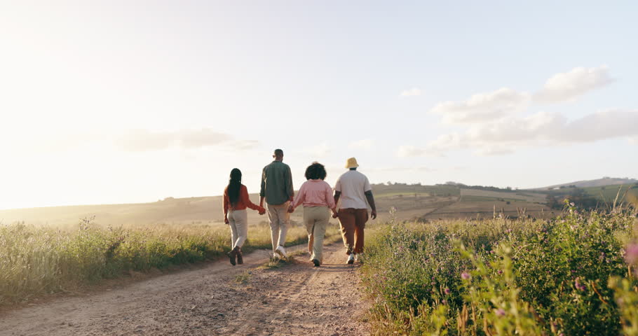 Group, friends and holding hands with holiday, back and summer break with adventure, fresh air and journey. People, outdoor and vacation with road trip getaway, wilderness and nature with mountains