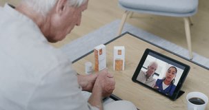 Home, video call and old man with tablet, medication and conversation with internet, healthcare and checkup. Pensioner, technology or nurse with advice, help and online consultation with pills or app