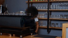 A dark-skinned young woman takes her phone out of her pocket in the middle shot and jumping. Take out your phone and be surprised. The barista took his phone out of his pocket in the coffee shop. - Powered by Shutterstock - Get 15% off with code: PIKWIZARD15