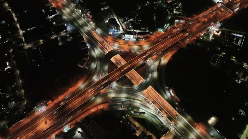 Drone aerial view, high angle, Hyperlapse time-lapse of car traffic transportation above circle roundabout road in Asian city, Public transport. expressway Royalty-Free Stock Footage #3418869097
