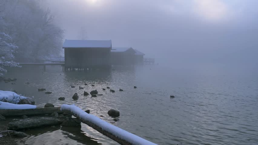 Foggy winter landscape in Kochel am See, Kochelsee, Bavaria, Germany