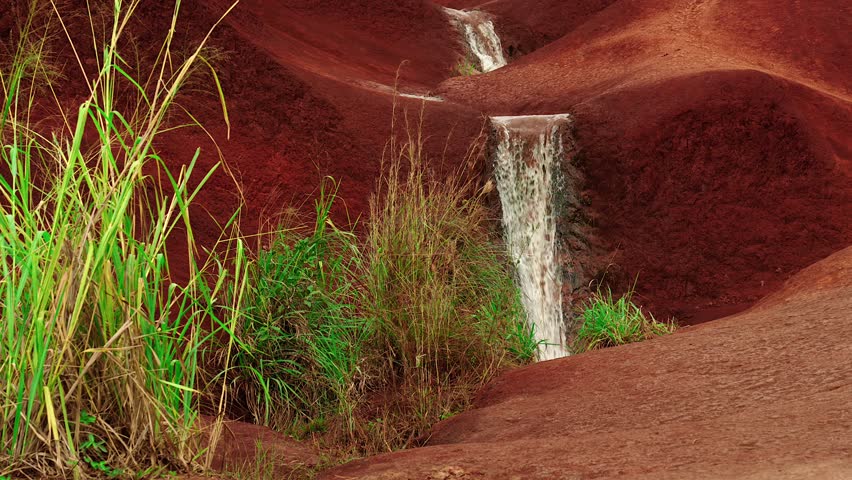 Slow motion video the Red Dirt Waterfalls in Kauai, Hawaii. Royalty-Free Stock Footage #3419002427
