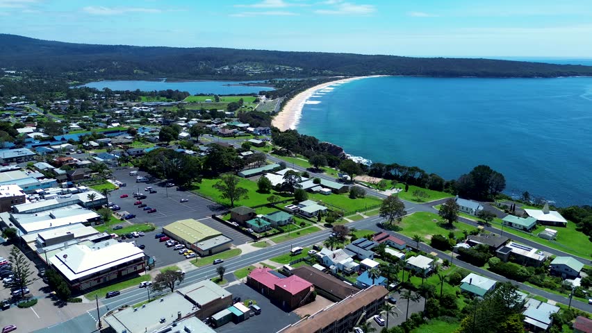 Drone aerial landscape Eden town centre shops housing residential street Aslings Beach Sapphire Coast Twofold bay Australia Royalty-Free Stock Footage #3419012457