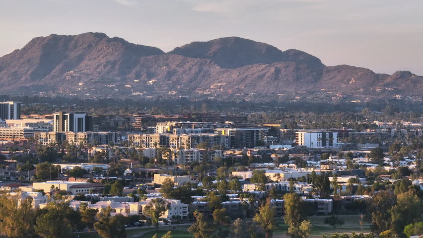 Aerial view of Scottsdale Arizona on a December evening at golden hour Royalty-Free Stock Footage #3419048375