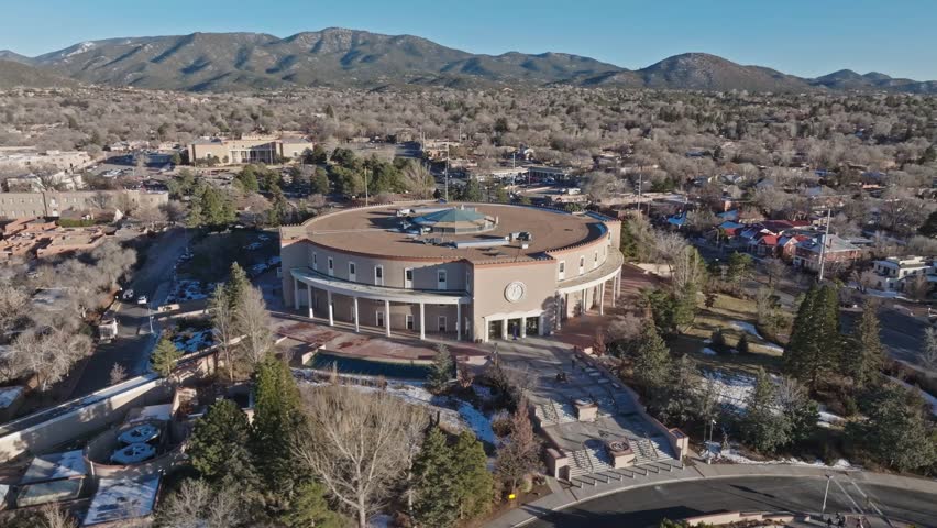 New Mexico State capitol building in Santa Fe, New Mexico with drone video circling left to right.