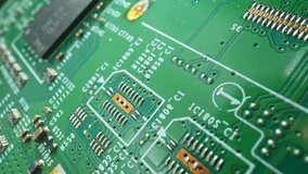 A Printed Circuit Board (PCB) is a vital electronic component, featuring interconnected conductive pathways. It facilitates electronic device functionality. Video footage. Innovation concept.
 - Powered by Shutterstock - Get 15% off with code: PIKWIZARD15