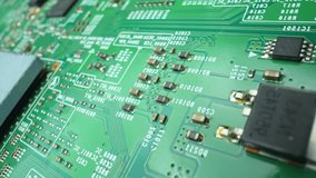 In this close-up masterpiece, a Printed Circuit Board (PCB) unveils its secrets. The symphony of components dances in intricate patterns. Macro video. Innovation concept.
 - Powered by Shutterstock - Get 15% off with code: PIKWIZARD15