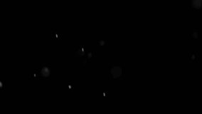 Real filmed snowfall in front of a black background as an overlay video. A telephoto lens with 180 mm focal length creates large round flakes that fall in slow motion.