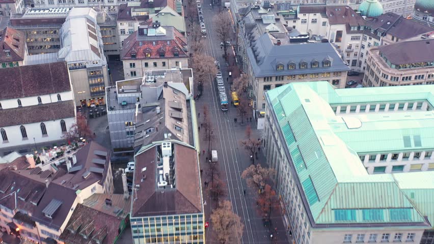 Zurich, Switzerland: Aerial footage of trams that runs along the luxury Bahnhofstrasse, the main business and shopping street in the heart of the banking and financial district