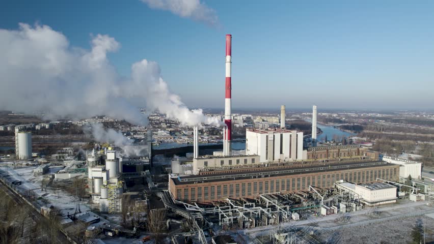 Drone approach shot of a large coal-fired thermal power plant complex in Poland. Royalty-Free Stock Footage #3419382921