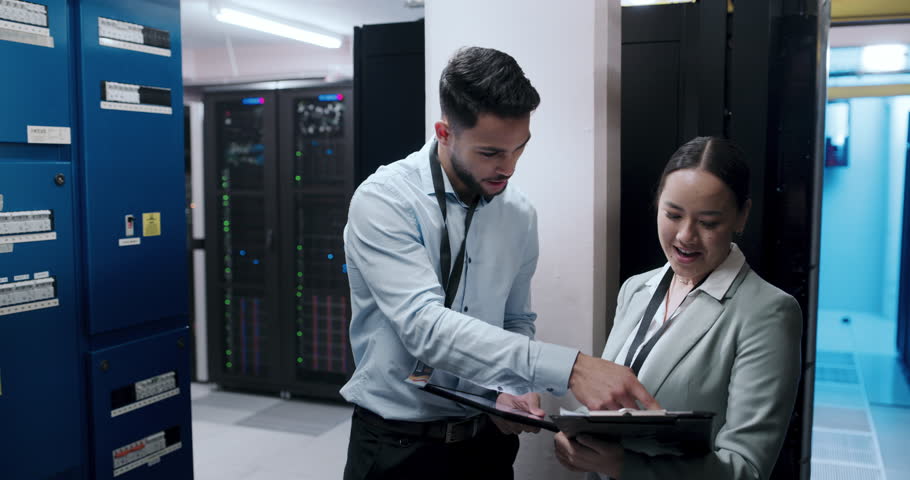 People, teamwork and server room, for cloud computing, digital solution and cybersecurity success with high five. Engineering man and woman with tablet, checklist and happy celebration in data center