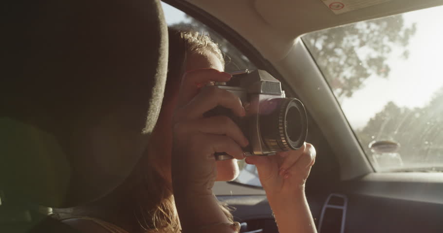 Digital camera, smile and woman on car road trip, travel journey or take memory photo of Australia holiday. Transportation, humour or passenger driving in SUV, van or excited for vacation photography