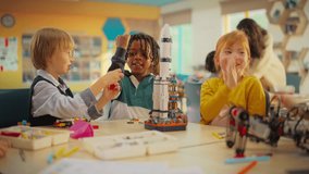 Team of Kids Finishing a Science Project and Celebrating with High Five. Talented Boys and Girls Created a Spaceship Model. Primary School Classroom with Children Working on Futuristic Technology - Powered by Shutterstock - Get 15% off with code: PIKWIZARD15