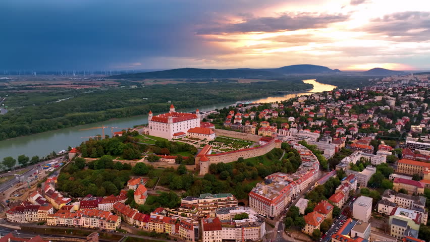Bratislava Castle or Bratislavsky Hrad aerial panoramic view sunset. Slovakia. 4K