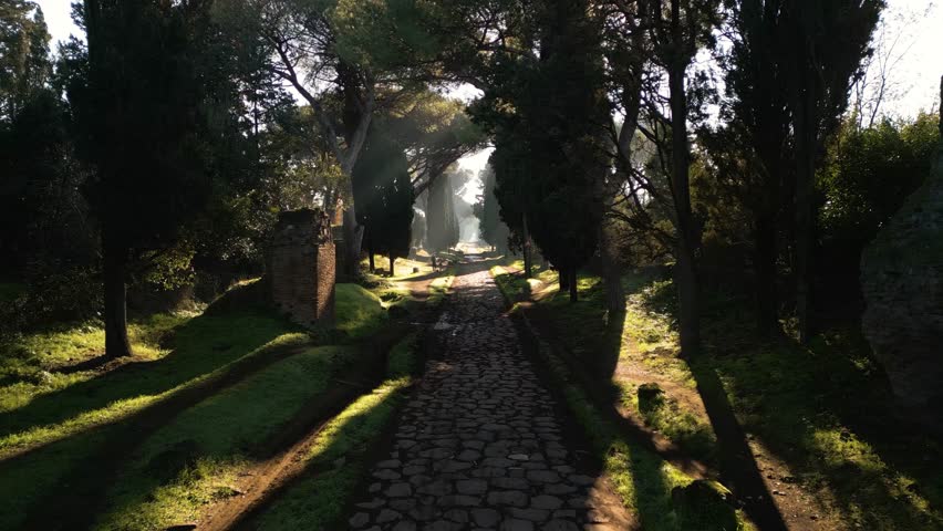 Beautiful Aerial View Above Cobblestoned Path - Via Appia Antica. Ancient Roman Road. Rome, Italy Royalty-Free Stock Footage #3419811095
